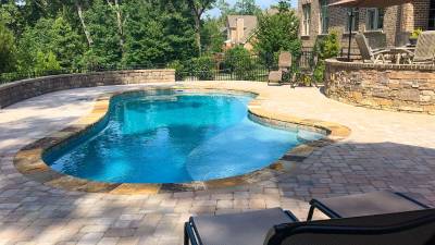 Natural shaped ice silver colored imagine pool shape installed