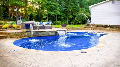 Fiberglass pool with spa and fountains