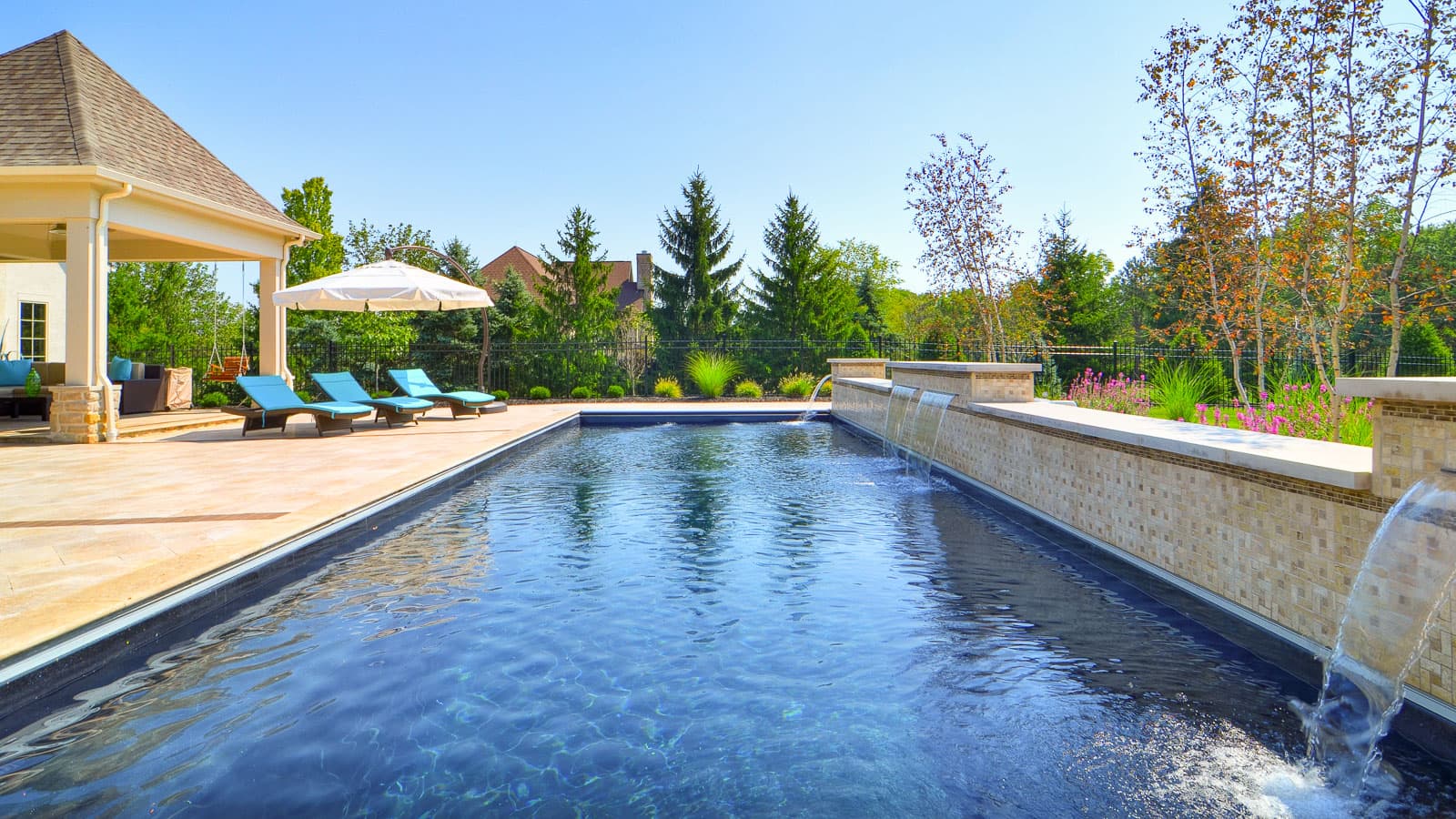 gorgeous rectangular fiberglass pool with fountains